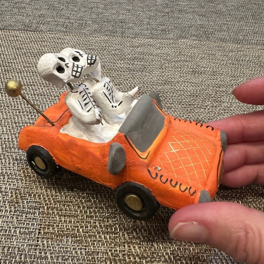 Day of the Dead Cruising Couple in Orange Car Dia de Los Muertos